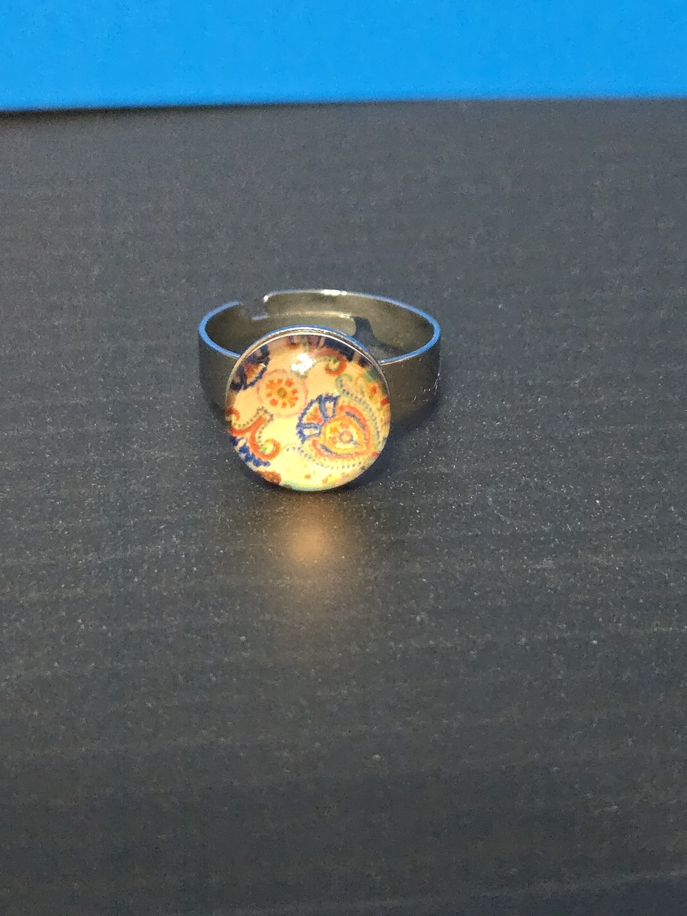 Adjustable Paisley Glass Ring in Orange and Blue